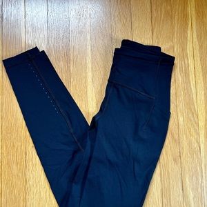Women’s Lululemon Running Tights with side stash pockets, like new